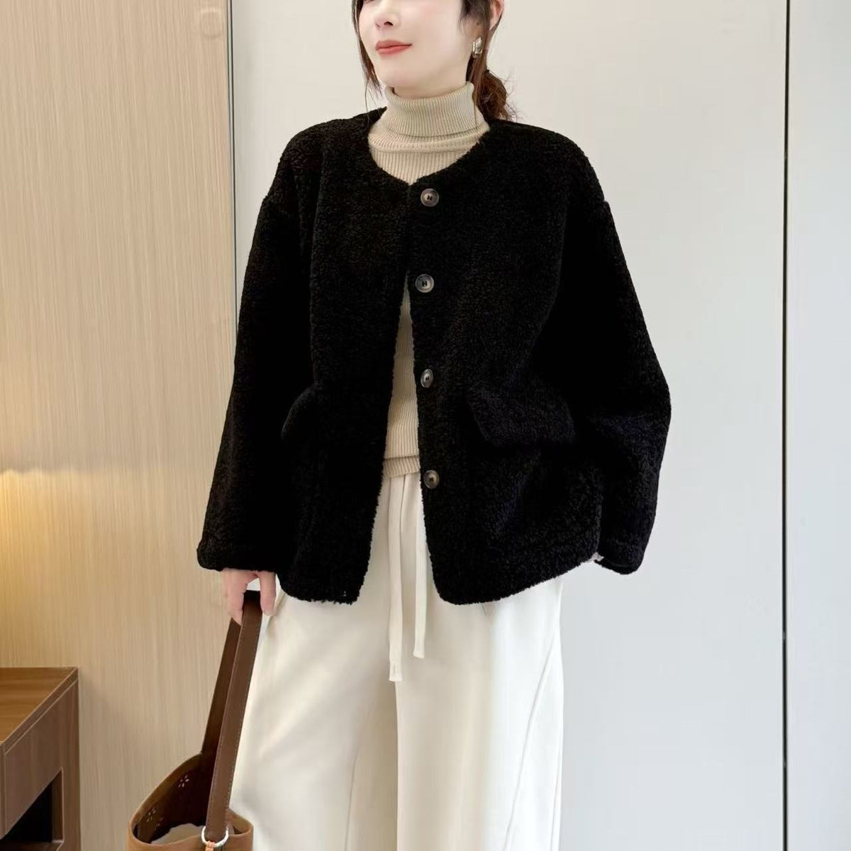Padded lamb fleece jacket in elegant style