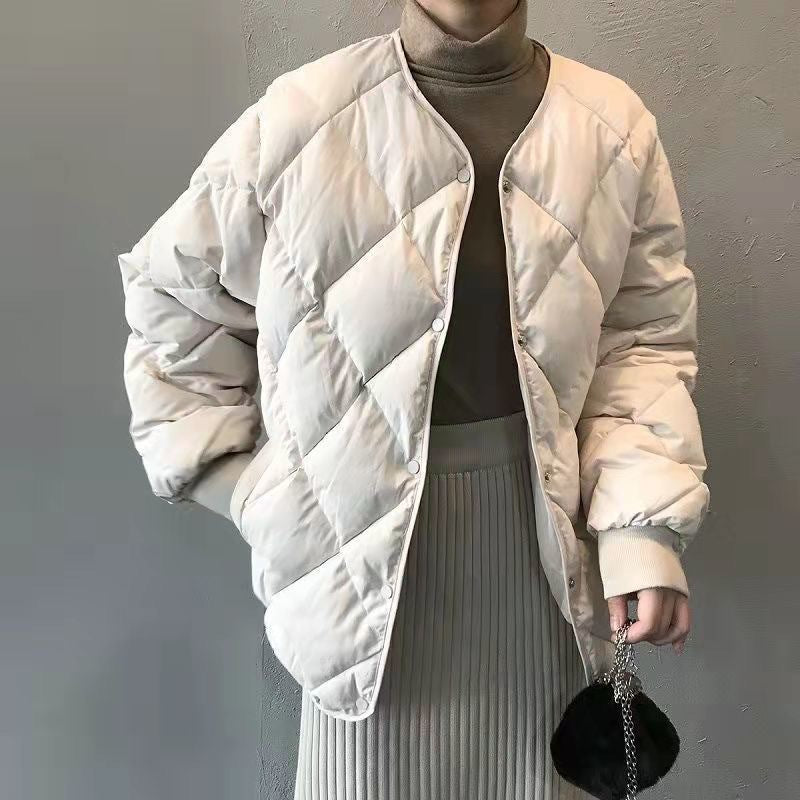 Short women's quilted jacket with diamond pattern