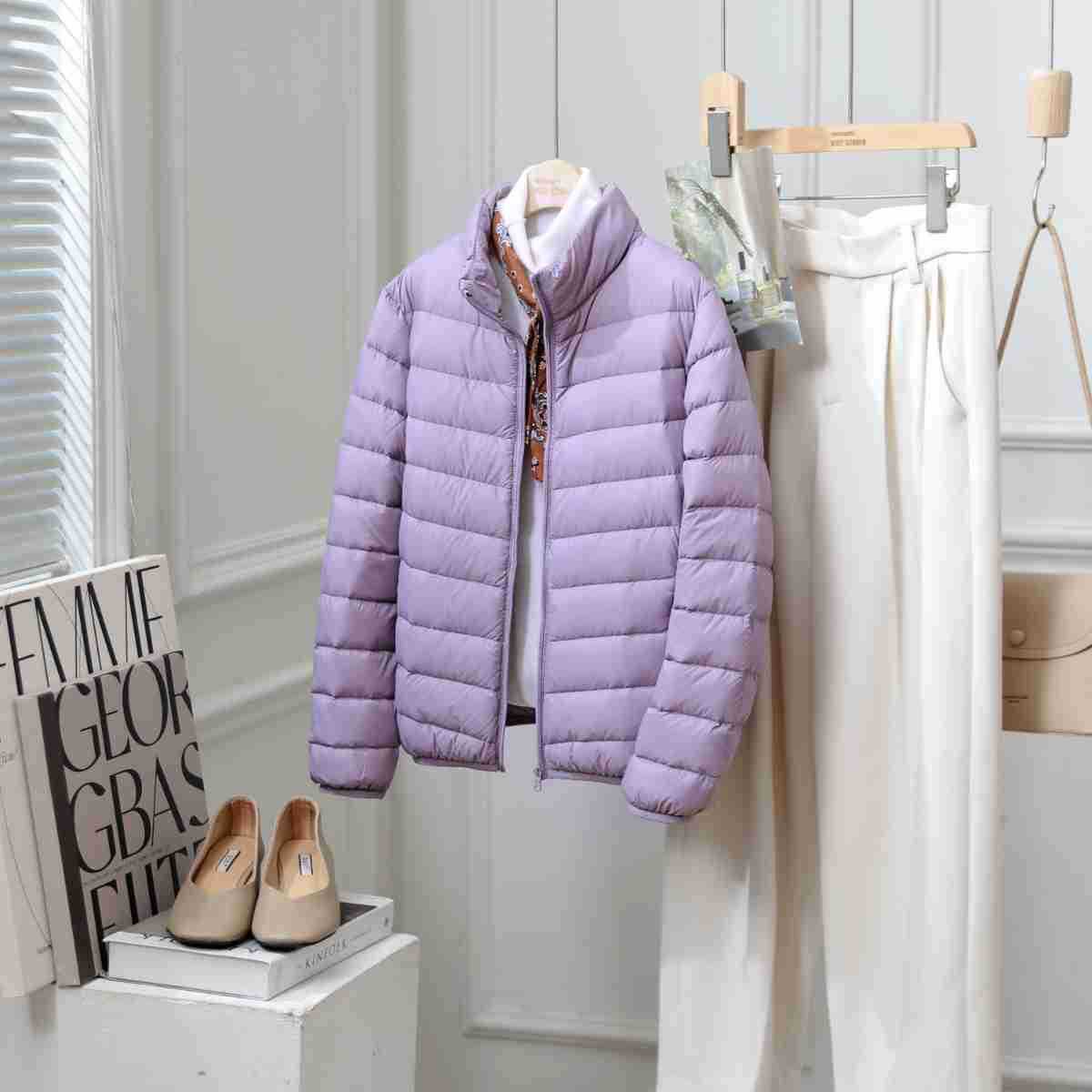 Light women's down jacket with stand-up collar, white duck down