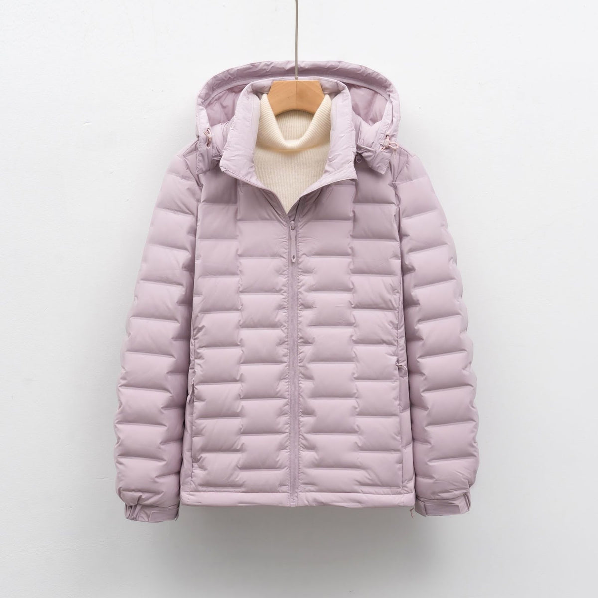 Light women's down jacket with hood, short