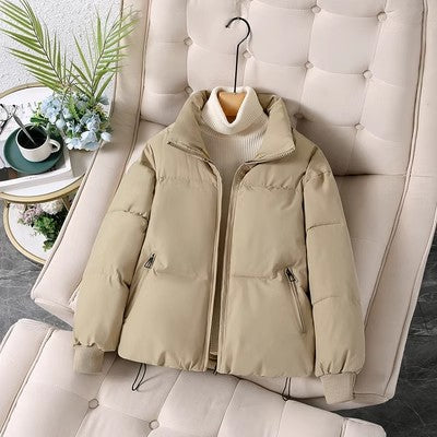 Short women's winter jacket with ribbed cuffs