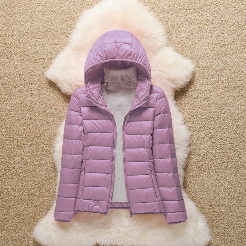 Light women's down jacket with hood and stand-up collar