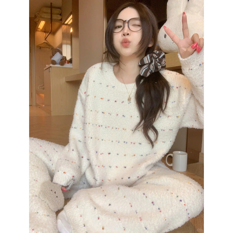 Warmer women's house suit made of plush, knit look