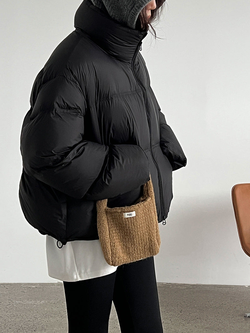 Women's down jacket with stand-up collar and white duck down filling