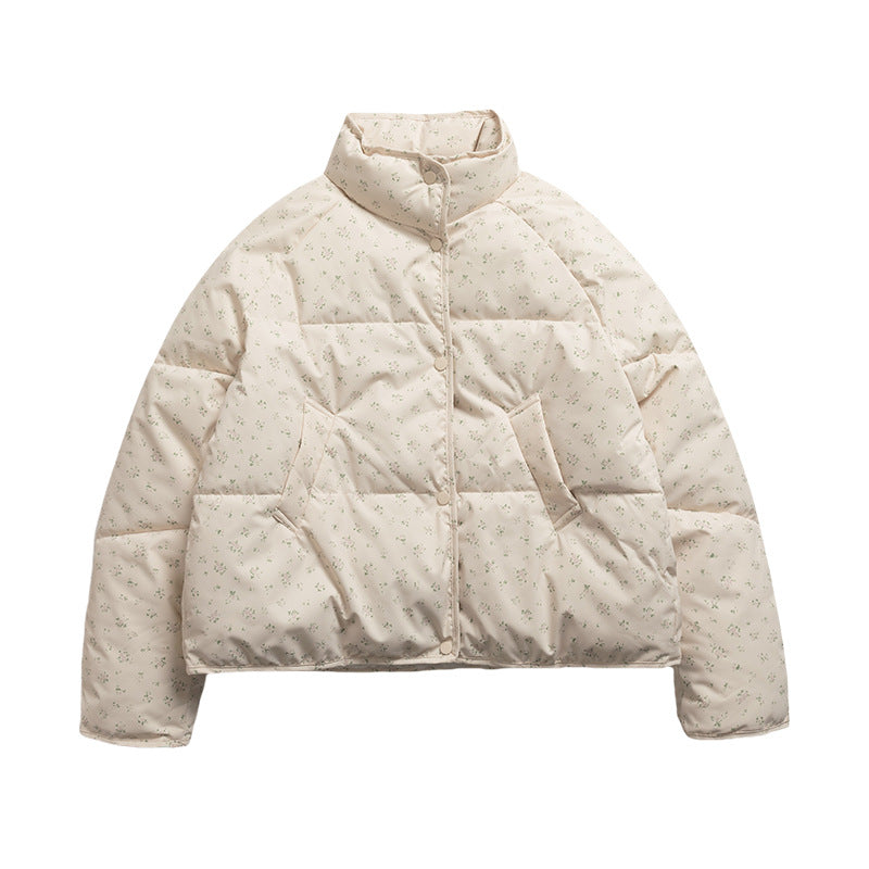 Short women's quilted jacket with stand-up collar and floral pattern