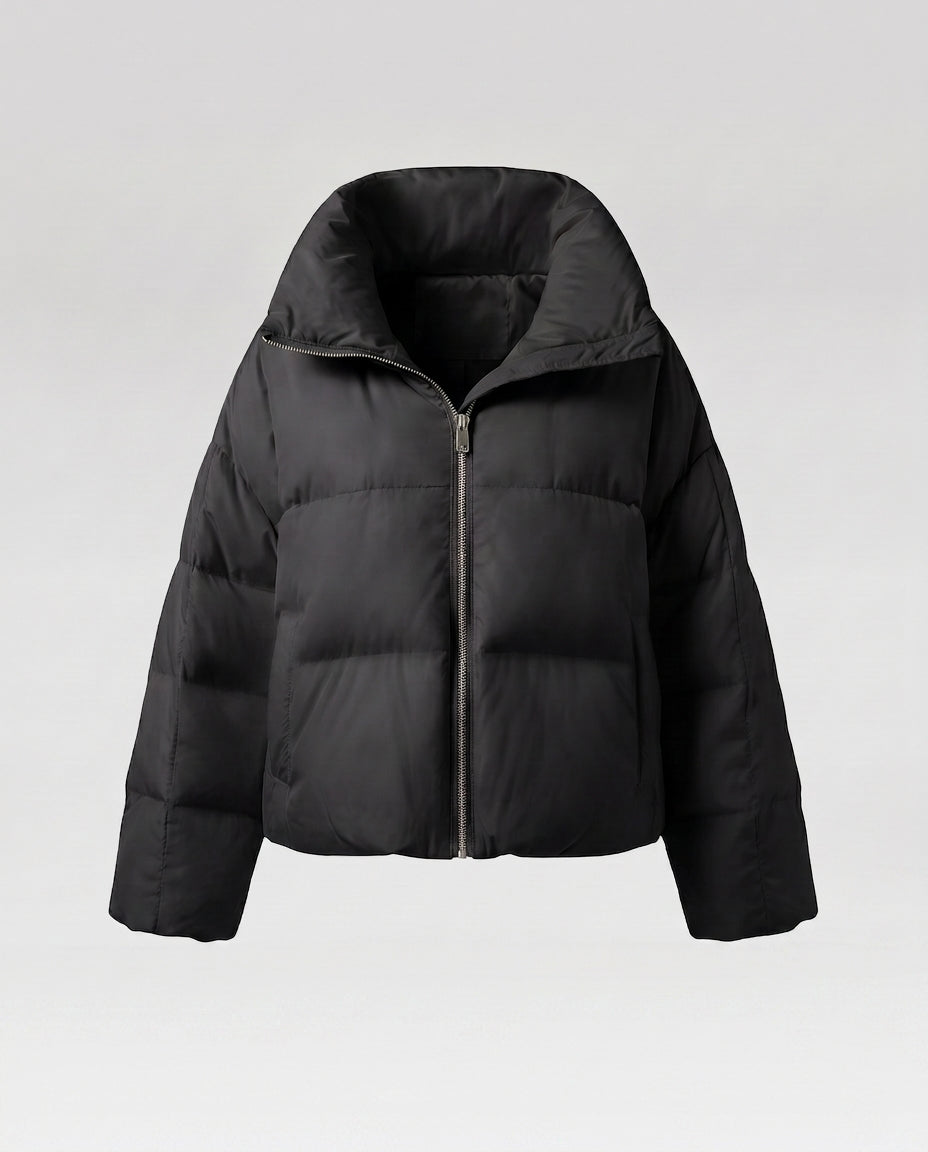 Women's cropped quilted jacket with oversized hood, lightweight thermal filling, and rounded hem