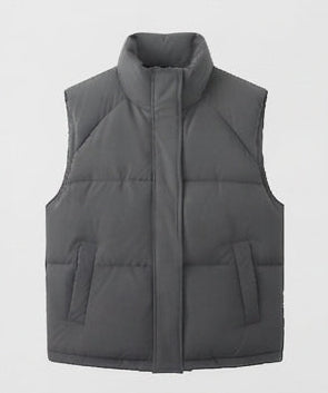 Women's non-padded thermal quilted vest with high standing collar, concealed two-way zipper, and practical flap pockets