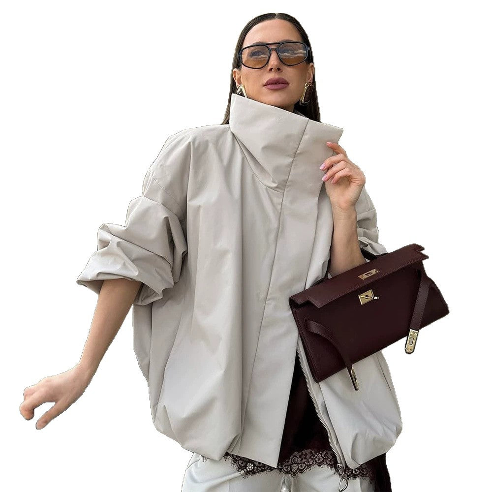 Women's boxy short quilted jacket with high asymmetric stand-up collar EVA-US