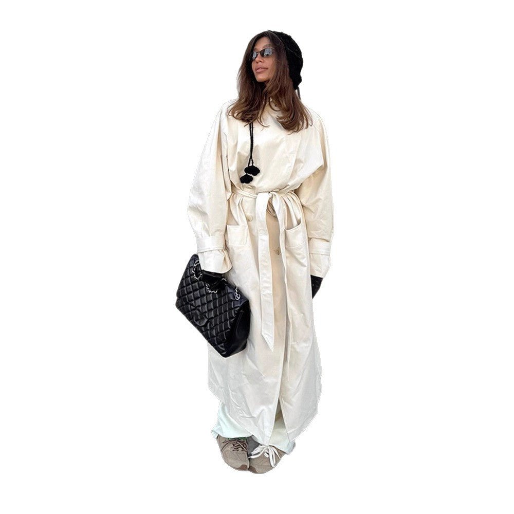 Women's maxilength tailored trench coat made of a light cotton blend with a tie belt EVA-US