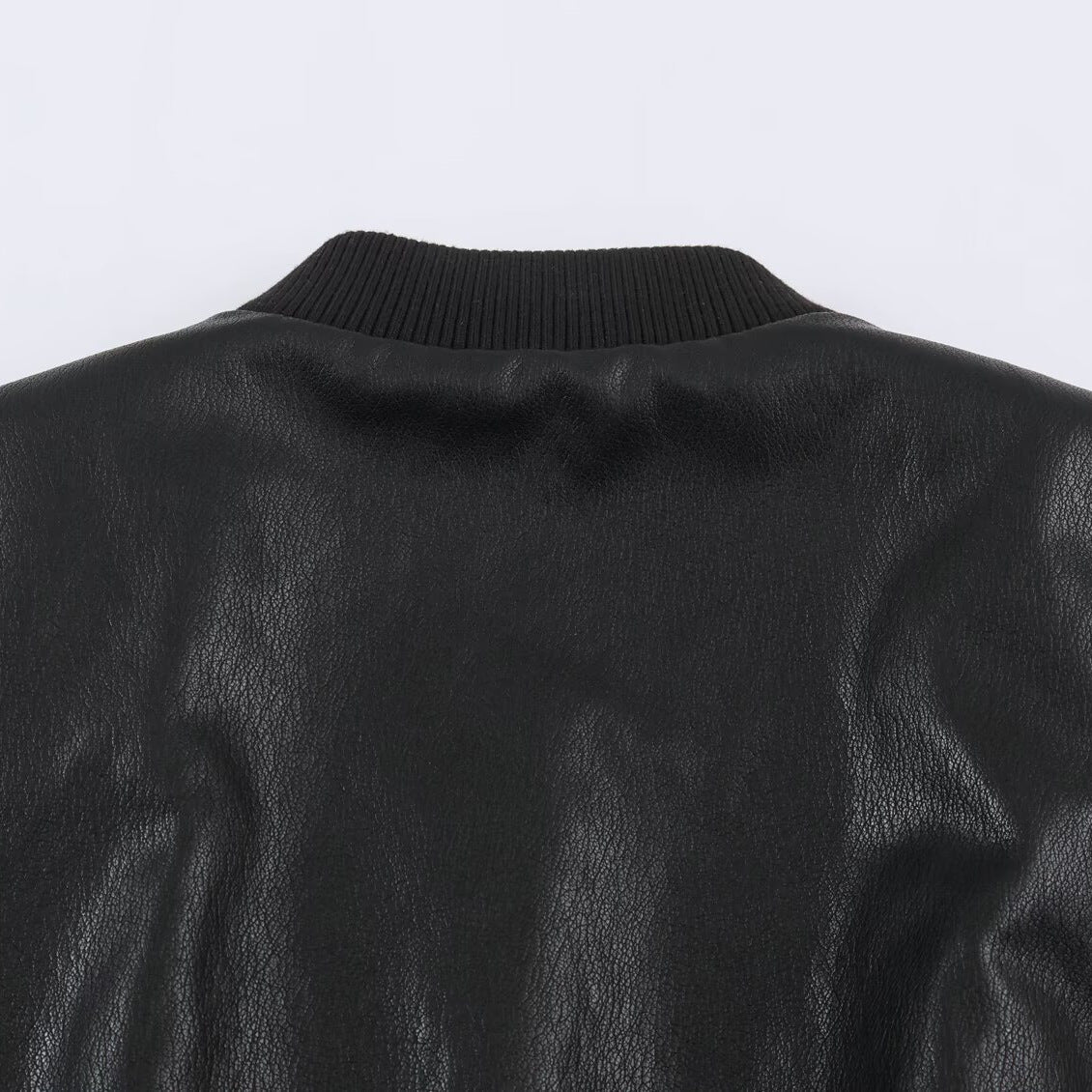 Women's bomber jacket in leather look with hidden flap, figure-hugging ribbed waistband and slanted flap pockets EVA-US