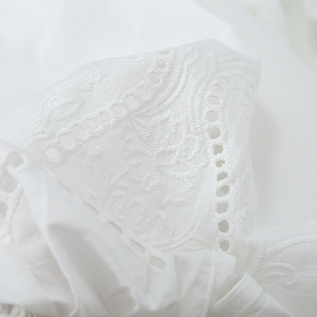 Women's blouse with V-neckline, broderie embroidery, and voluminous puff sleeves EVA-US