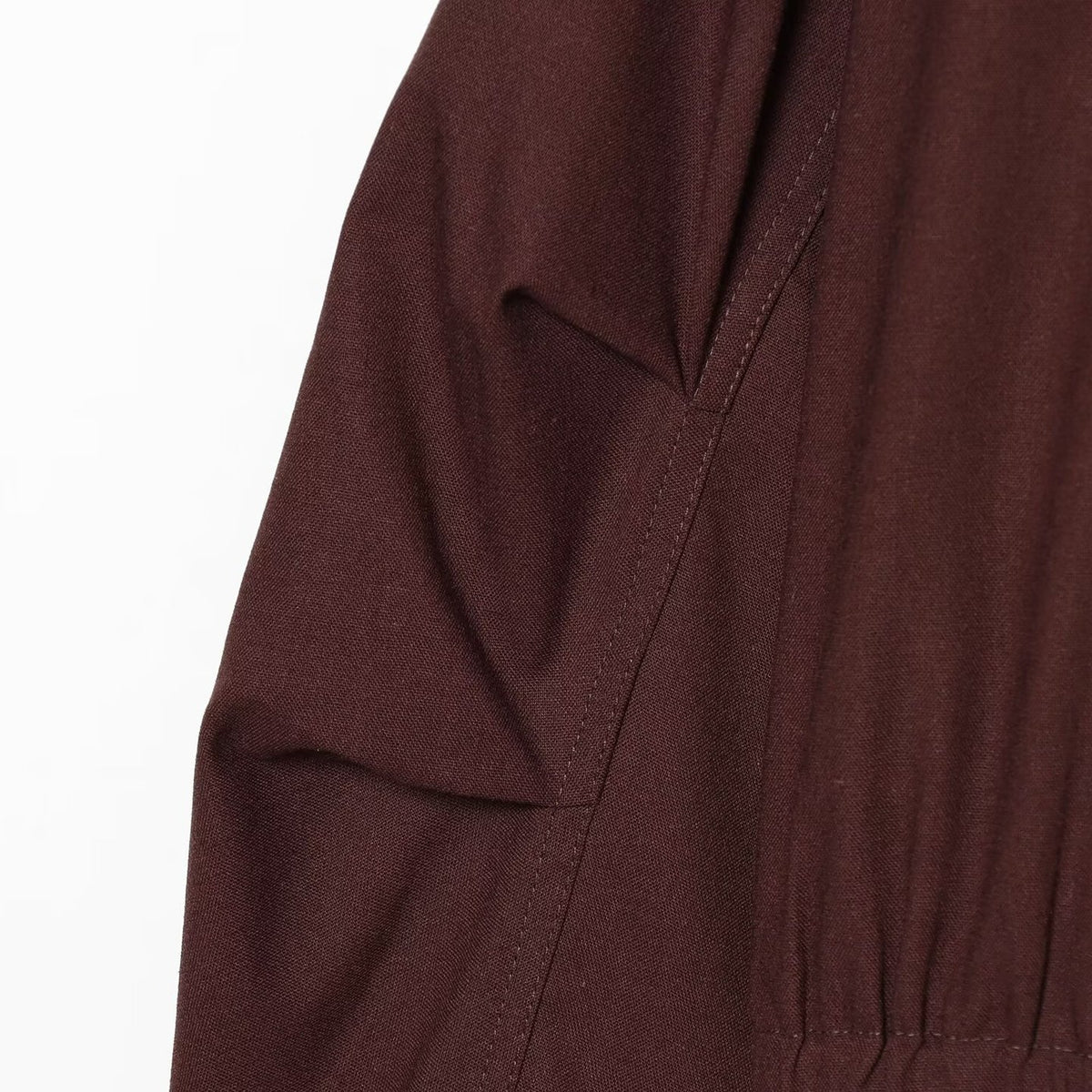 Women's short bomber-style jacket with high funnel collar, concealed zipper, and flap pockets EVA-US