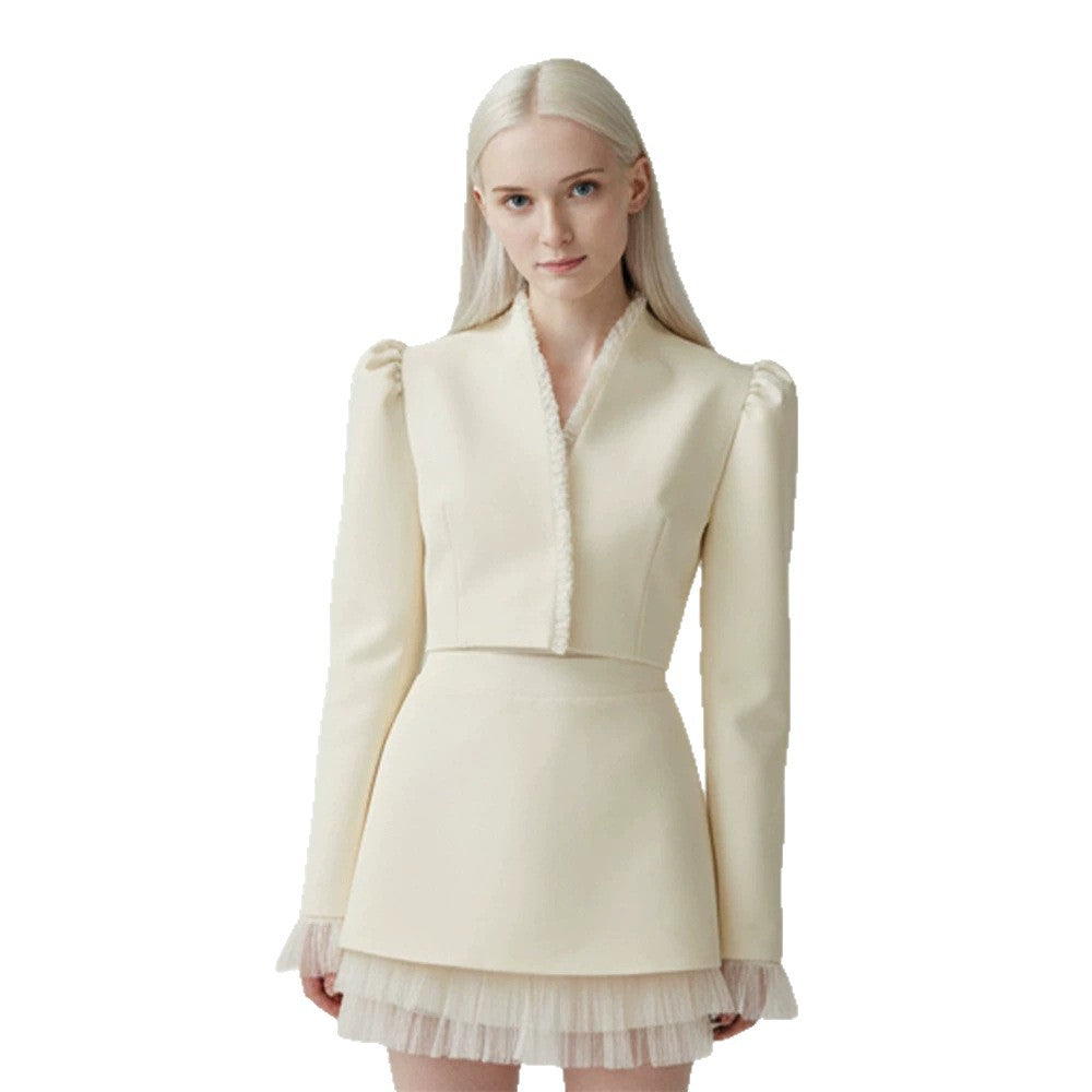 Ladies short blazer with tailored cropped silhouette, gathered shoulders and delicate tulle cuffs EVA-US