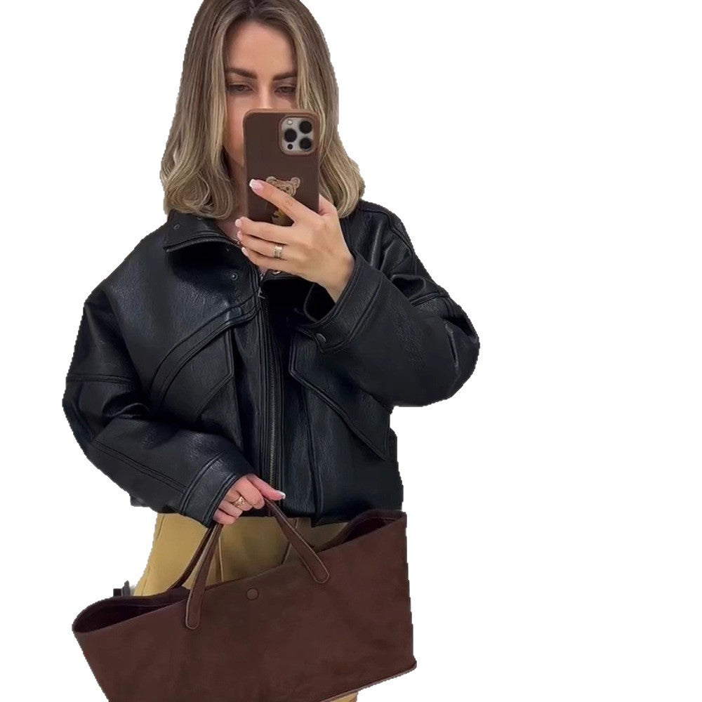 Women's oversized bomber jacket made of textured faux leather with overlapping flap front EVA-US