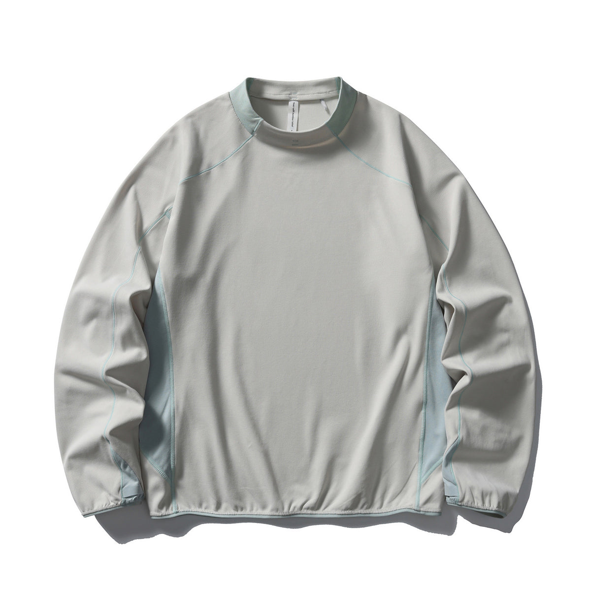 Unisex technical mock neck long sleeve with raglan seams, contrast inserts, and elastic hem EVA-US