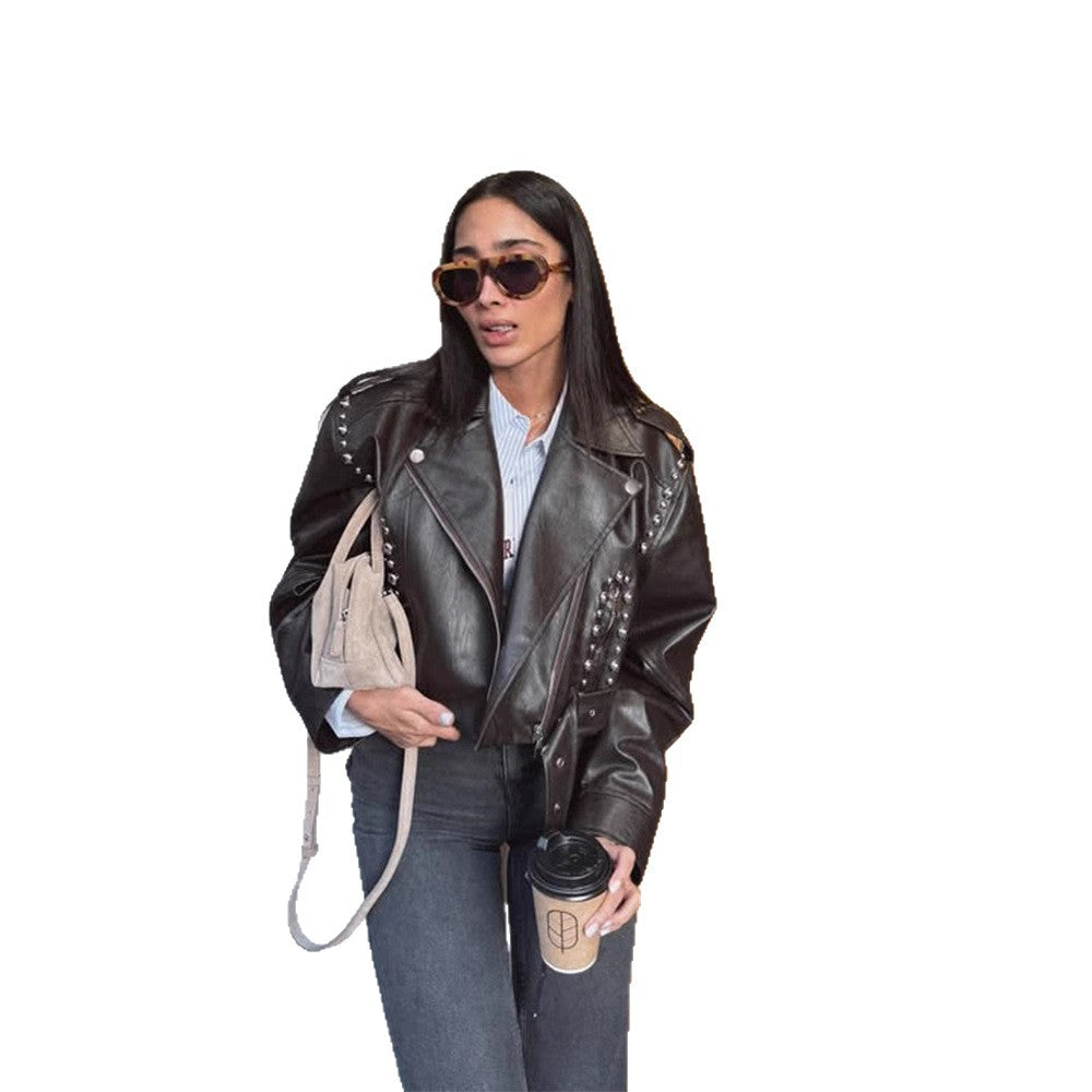 Women's Short Studded Biker Jacket Made of Faux Leather with Waist Belt EVA-US