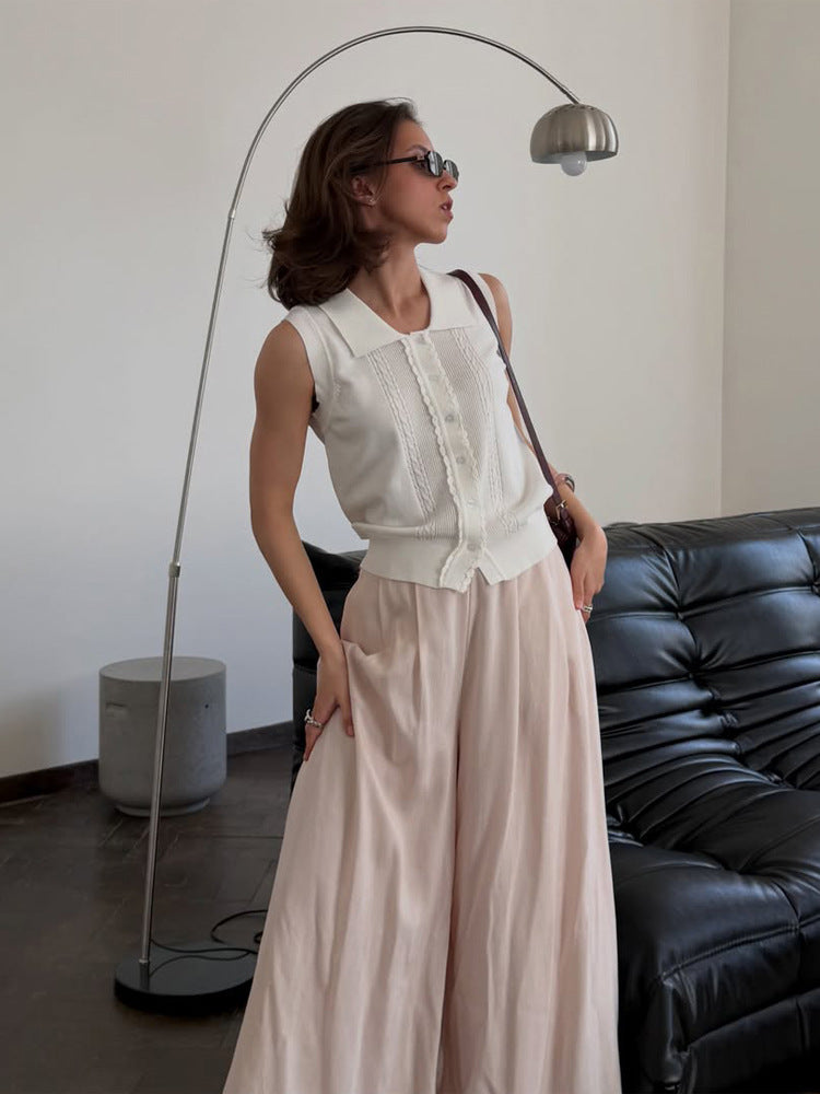 Women's sleeveless knit top with shirt collar, decorative button placket and fine structuring EVA-US