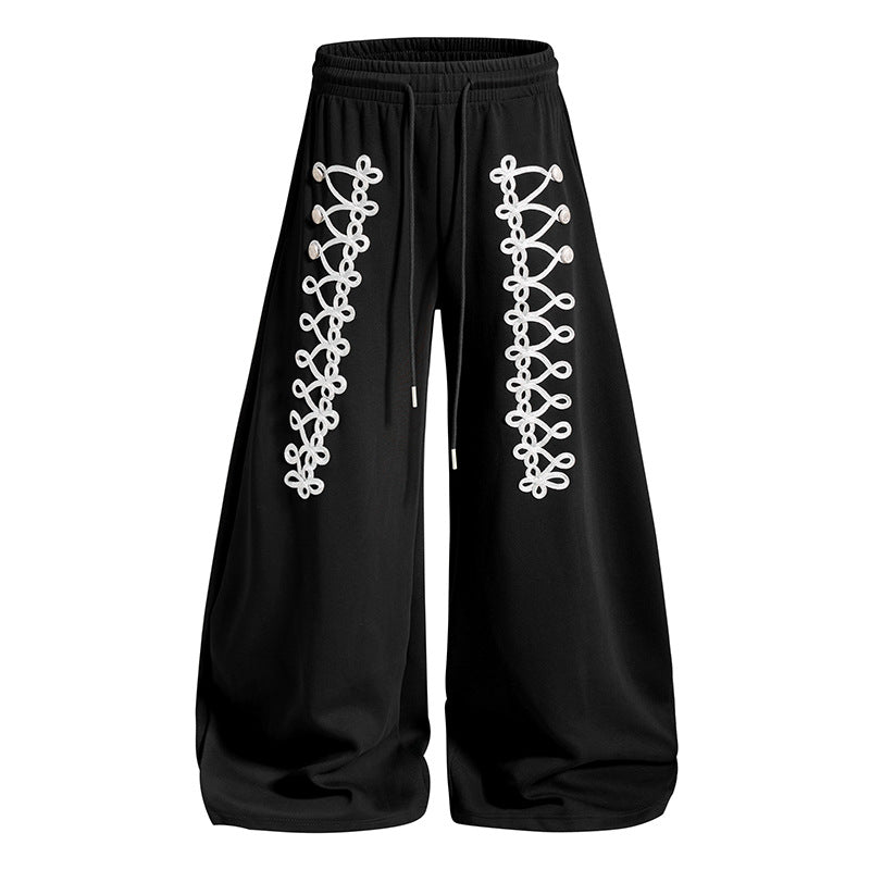 Women's loose jogging pants with elastic waistband and decorative lacing EVA-US