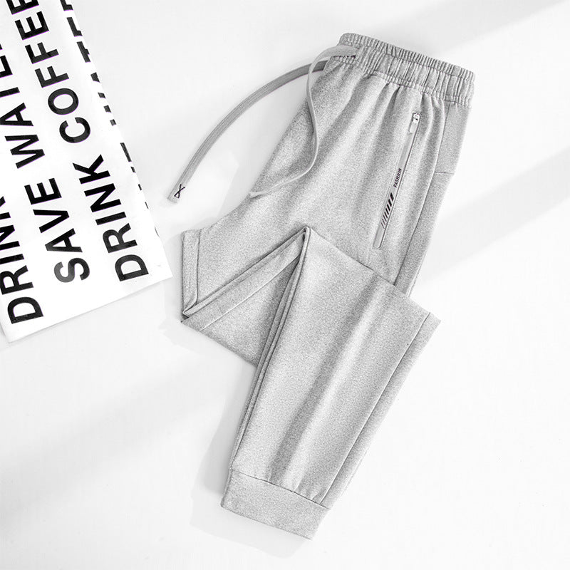 Men's Sporty Jogging Pants with Zipper Pockets, Elastic Waistband, and Slim Fit
