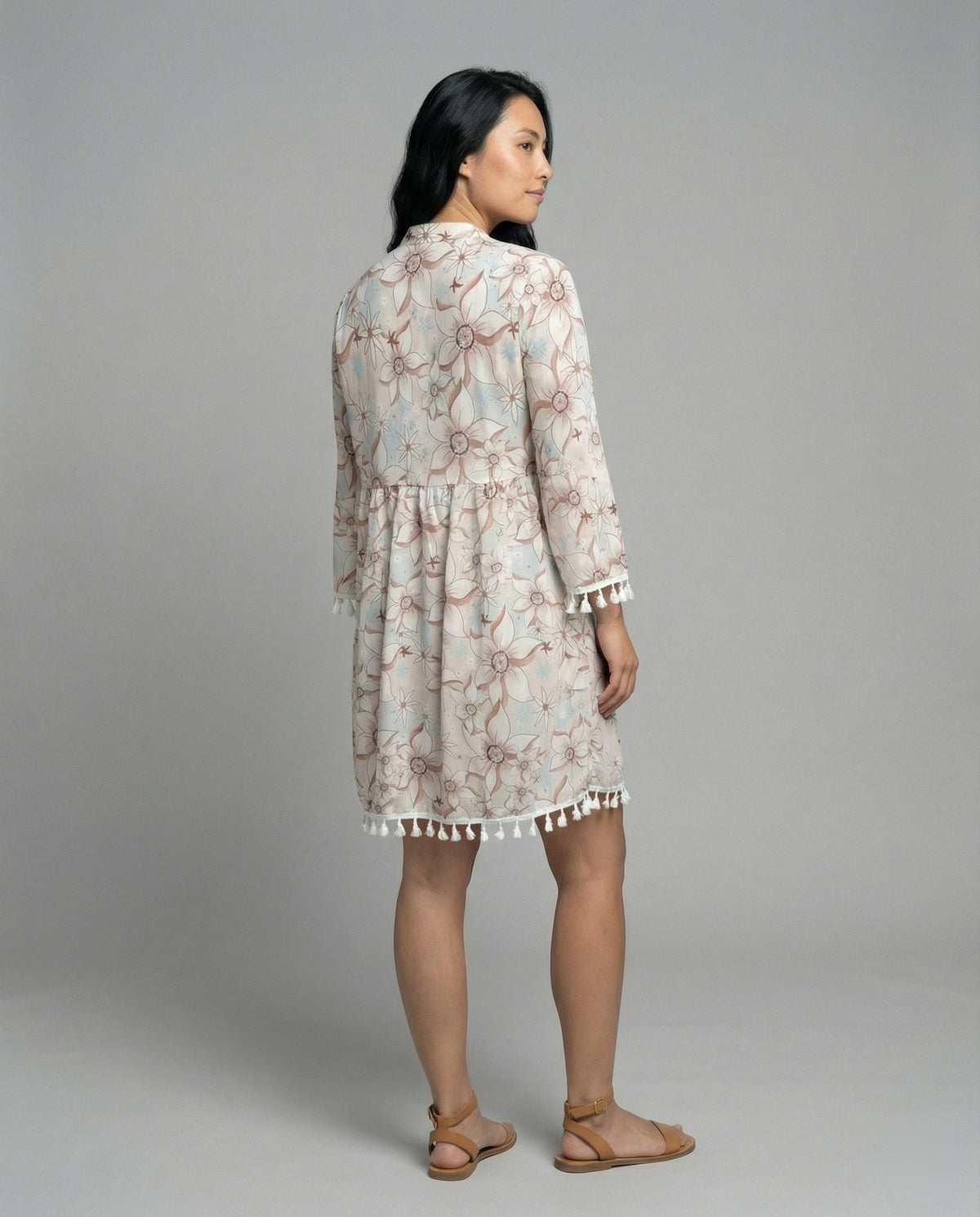 Women’s beach dress with high collar and romantic floral pattern