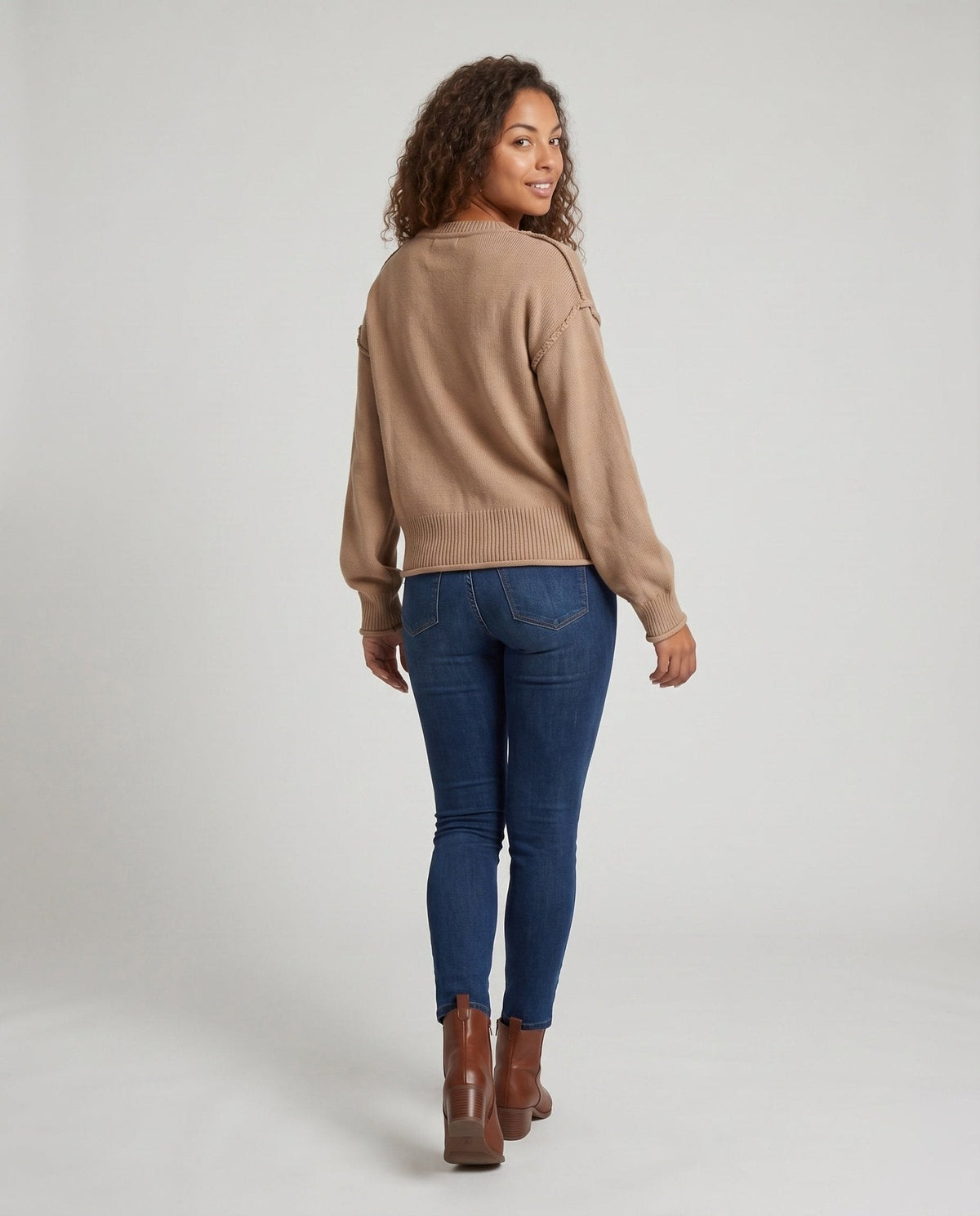 Women's knit sweater with unique structural details and a practical chest pocket - Chichicherry