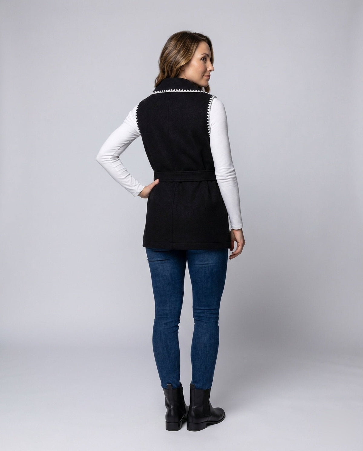 Women's long vest with elegant button closure and tapered belt - Chichicherry