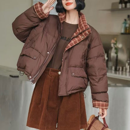 Short women's down jacket with high filling volume