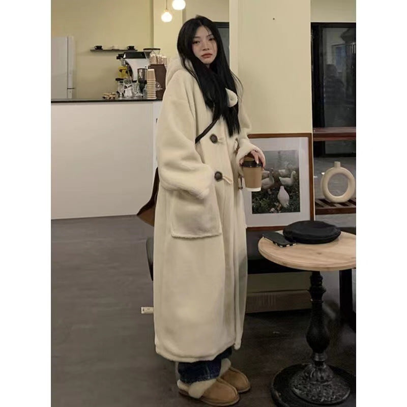 Mid-length women's winter coat with toggle buttons