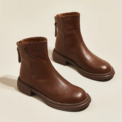 Women's leather ankle boots with back zipper and low heel