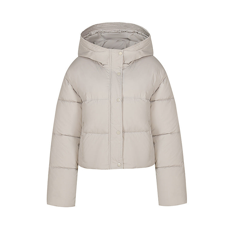 Short quilted jacket for women with stand-up collar and button placket