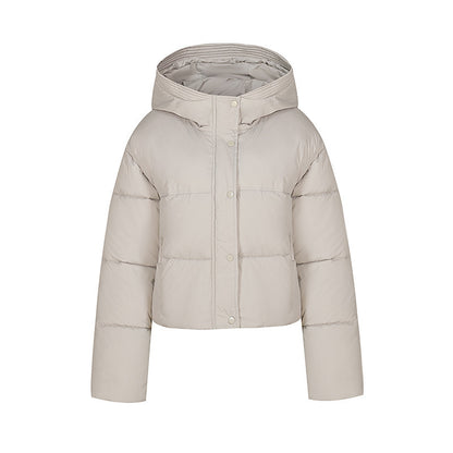 Short quilted jacket for women with stand-up collar and button placket