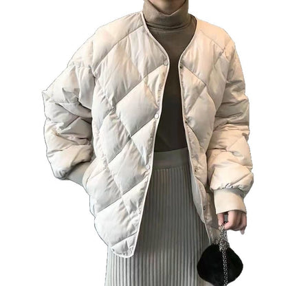 Short women's quilted jacket with diamond pattern