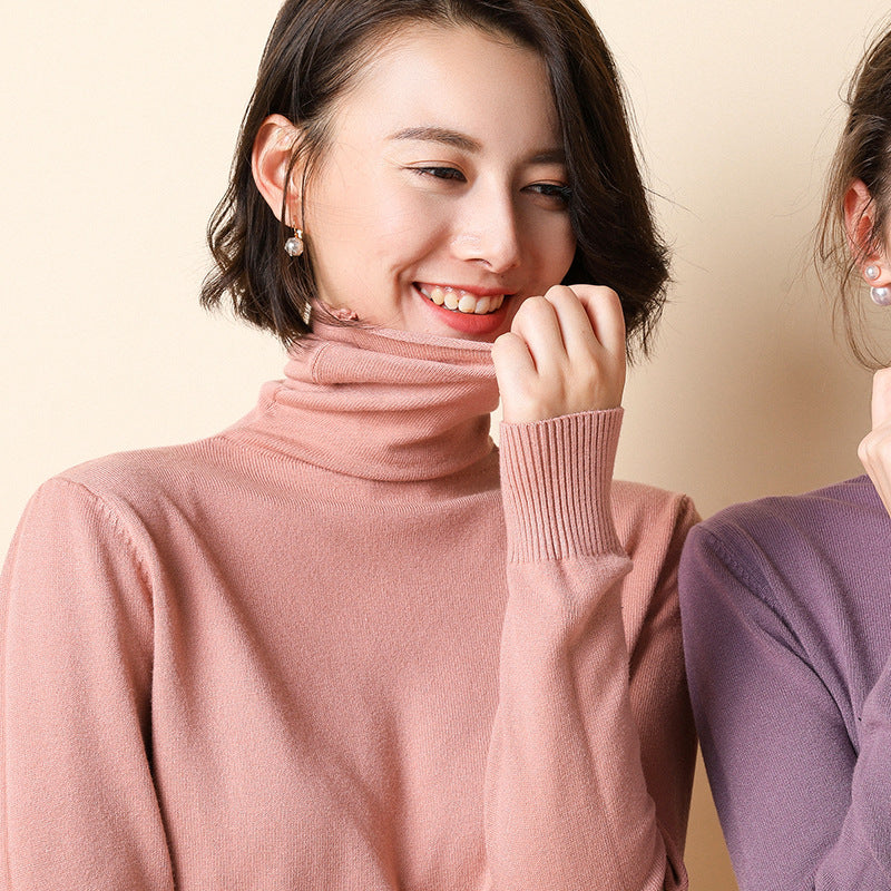 Women's knitted pullover with stand collar and geometric pattern