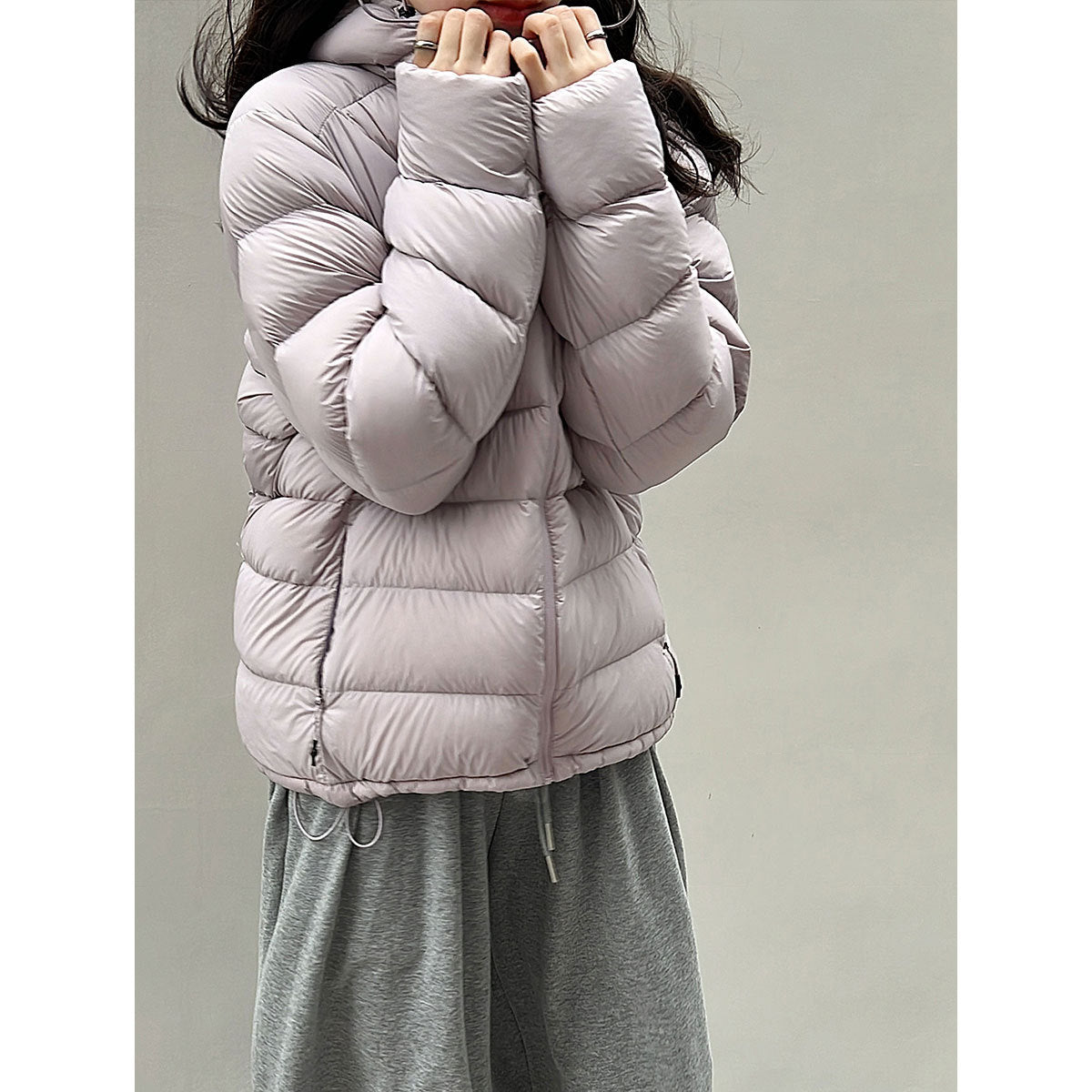 Light women's down jacket with hood, white duck down