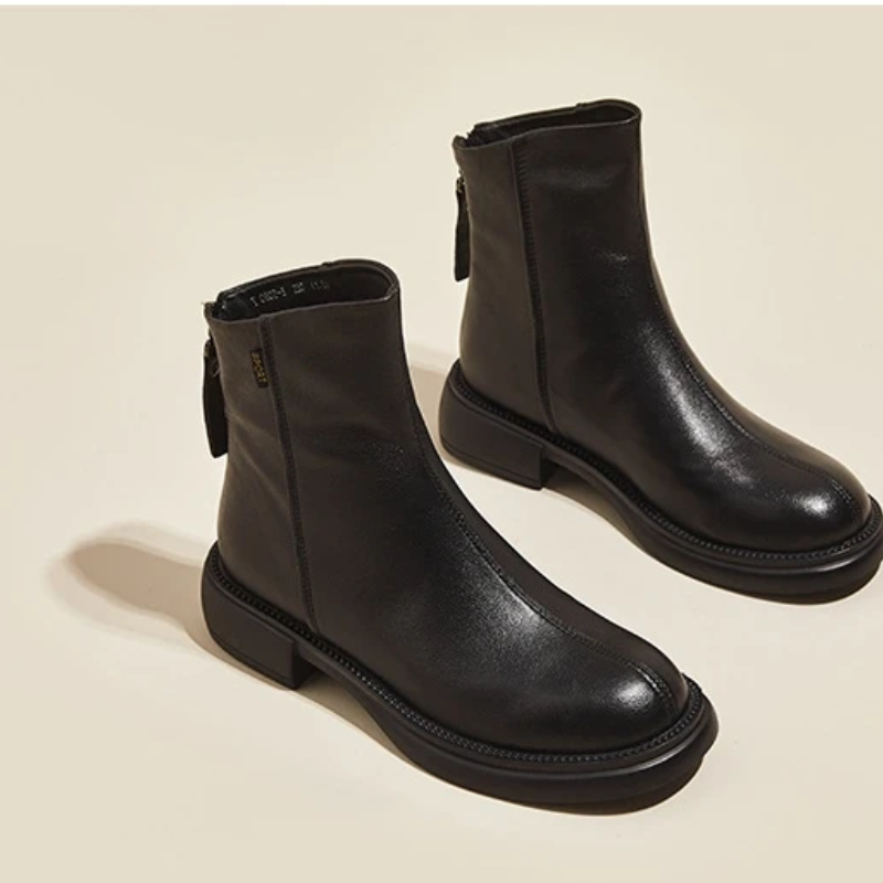Women's leather ankle boots with back zipper and low heel