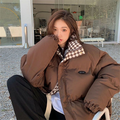 Short, padded women's jacket in oversized style