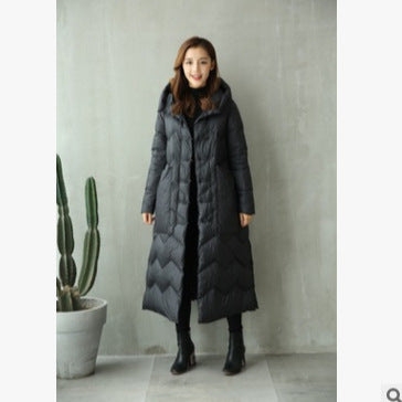 Long down jacket in vintage style with toggle closures