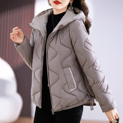 Short women's quilted jacket, glossy, with hood