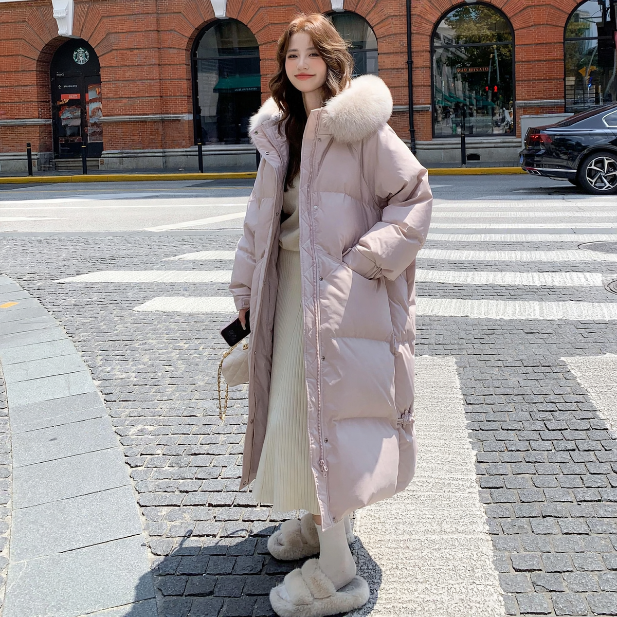 Long women's down jacket in plus size with fur collar