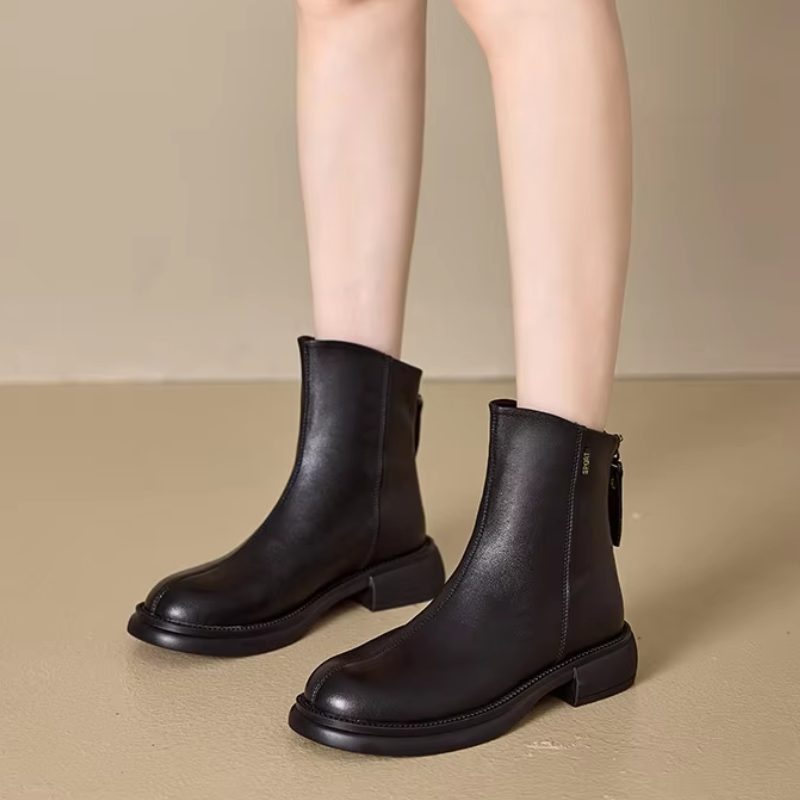 Women's leather ankle boots with back zipper and low heel