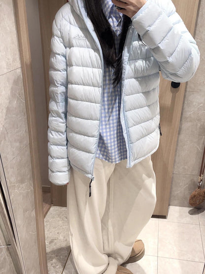Light women's down jacket with hood
