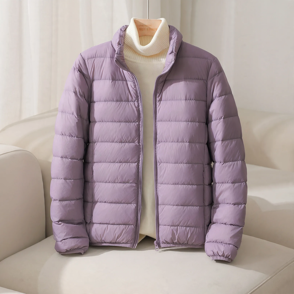 Short, lightweight women's down jacket, stand-up collar