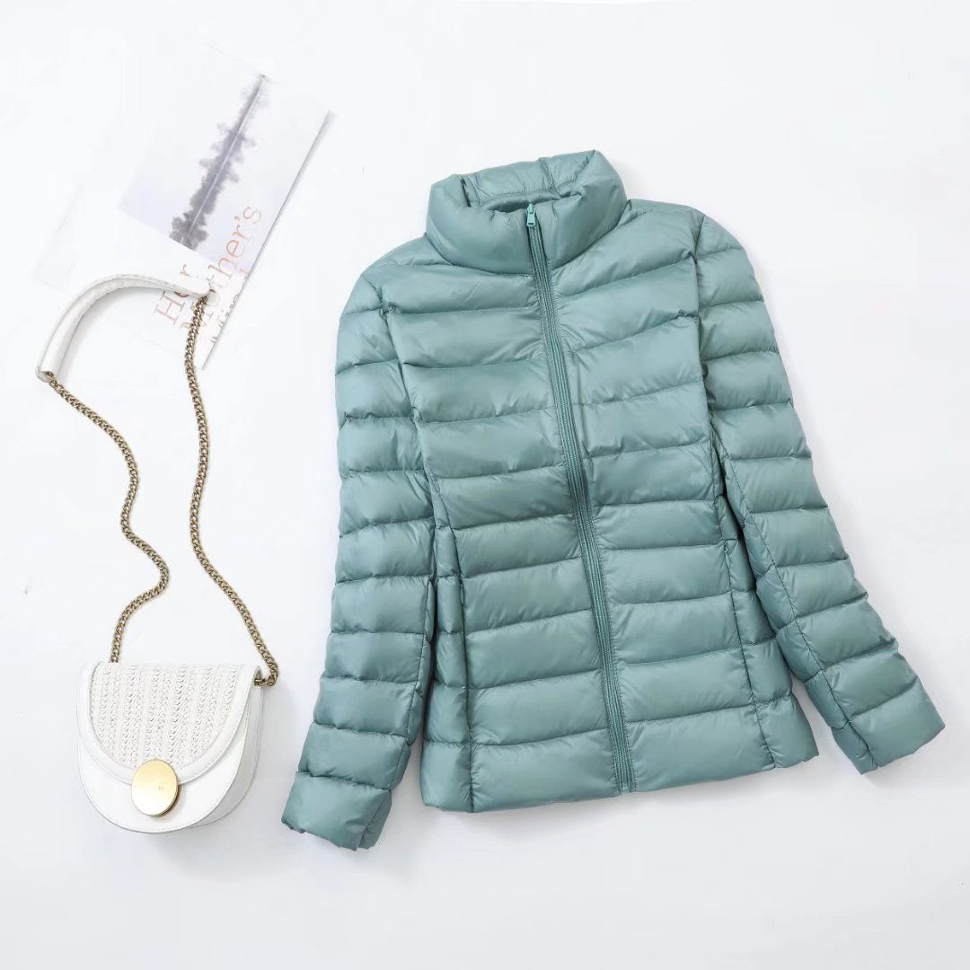 Light women's down jacket, stand-up collar, slim fit