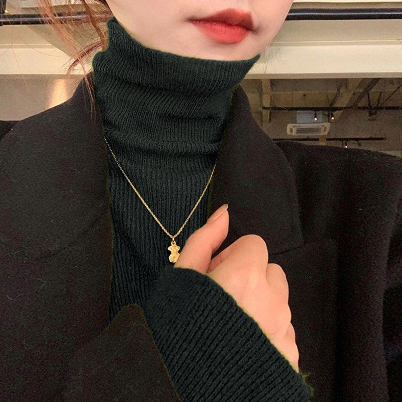 Narrow turtleneck knitted sweater