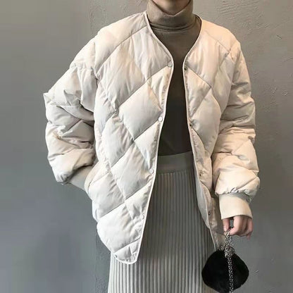 Short women's quilted jacket with diamond pattern