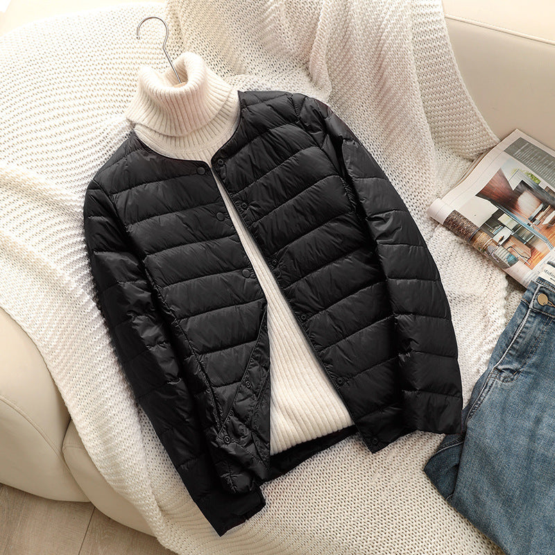 Light women's down jacket, short, with duck down