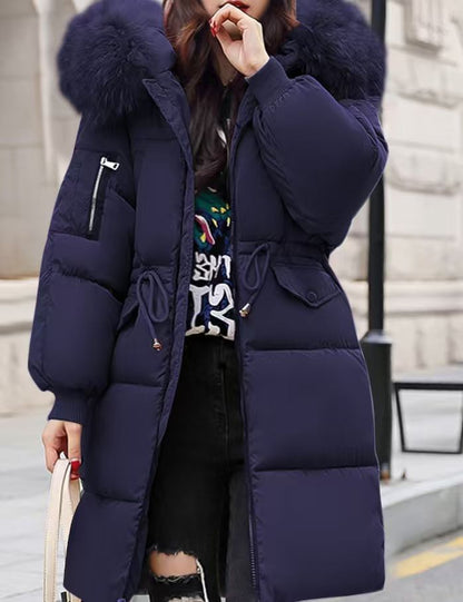 Padded women's winter jacket, mid-length, with fur collar