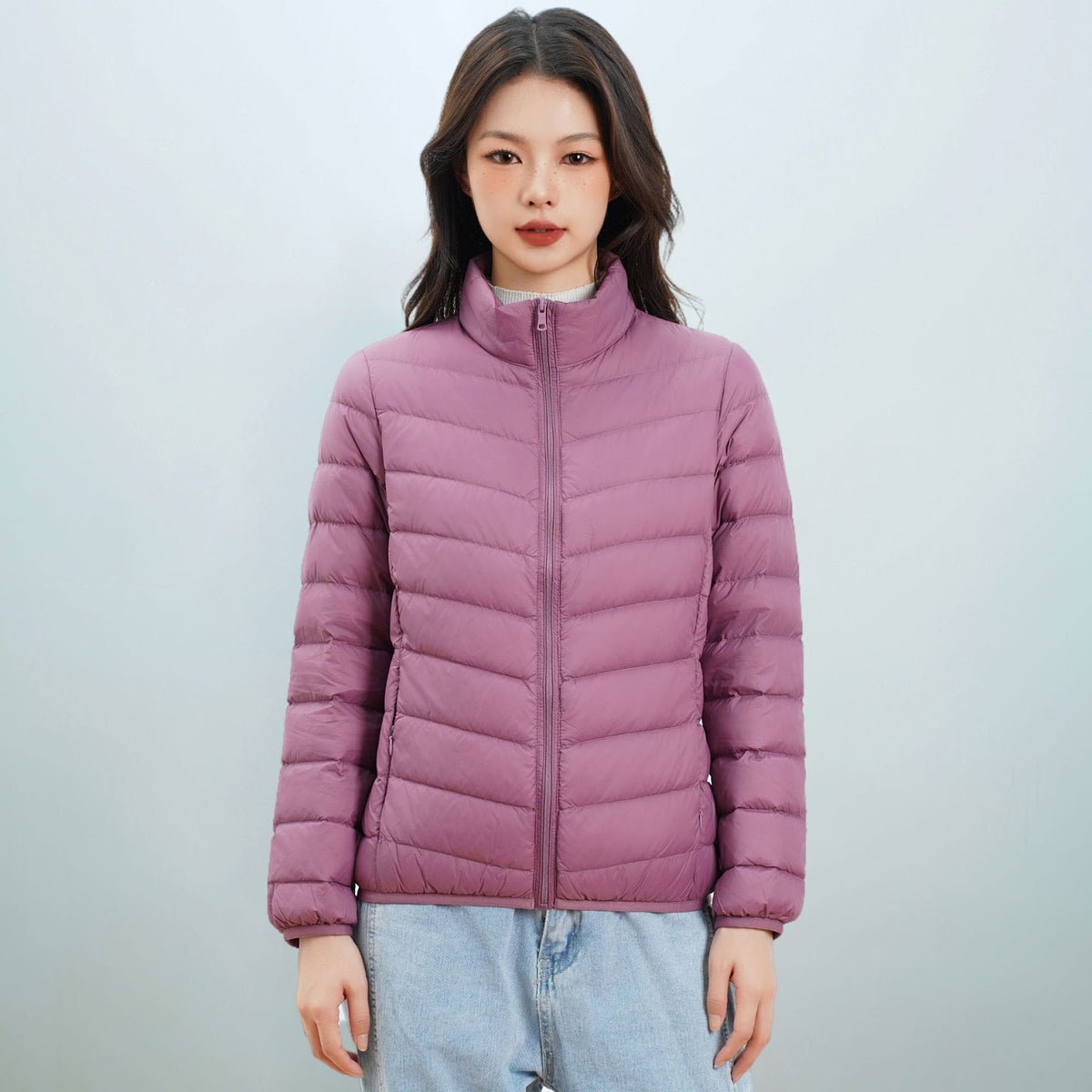 Light women's down jacket with stand-up collar