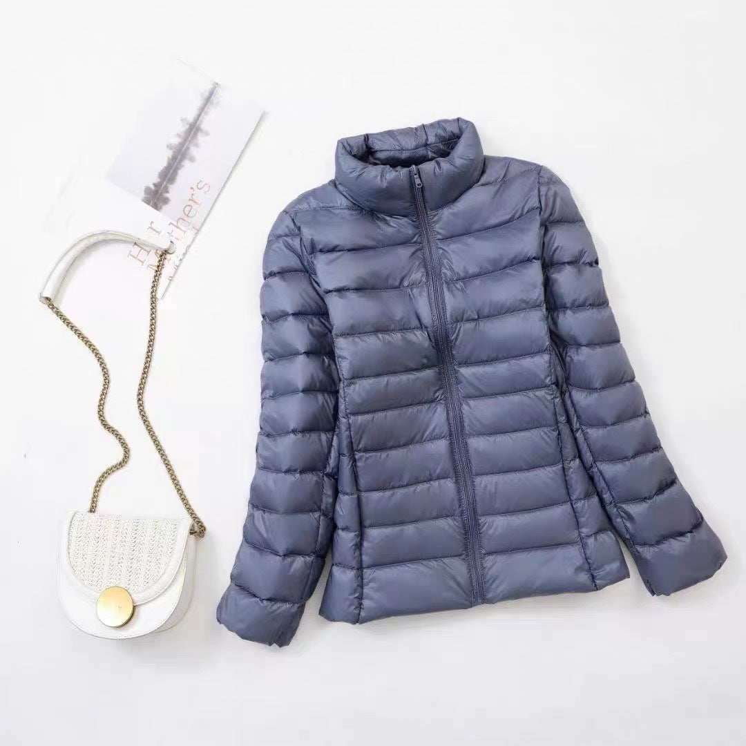 Light women's down jacket with stand-up collar, white duck down