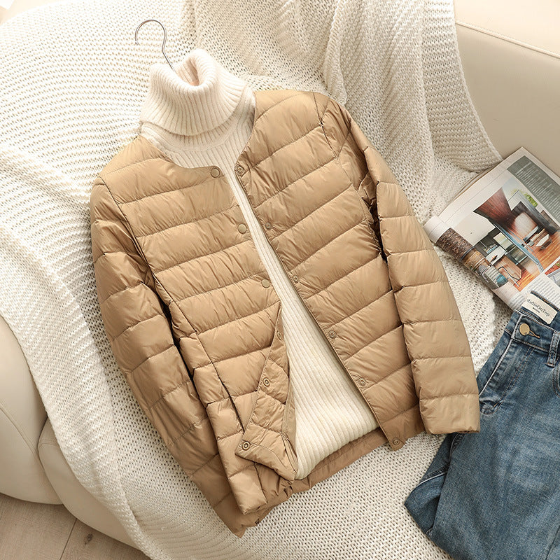 Light women's down jacket, short, with duck down